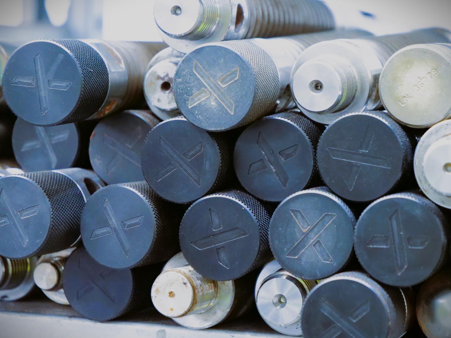 pile of metal bolts and nuts