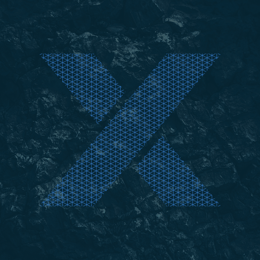 IMDEX data management software - rock wall with blue X icon overlay
